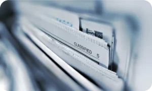Image of file folder containing certifications of compliance for regulated medical waste disposal